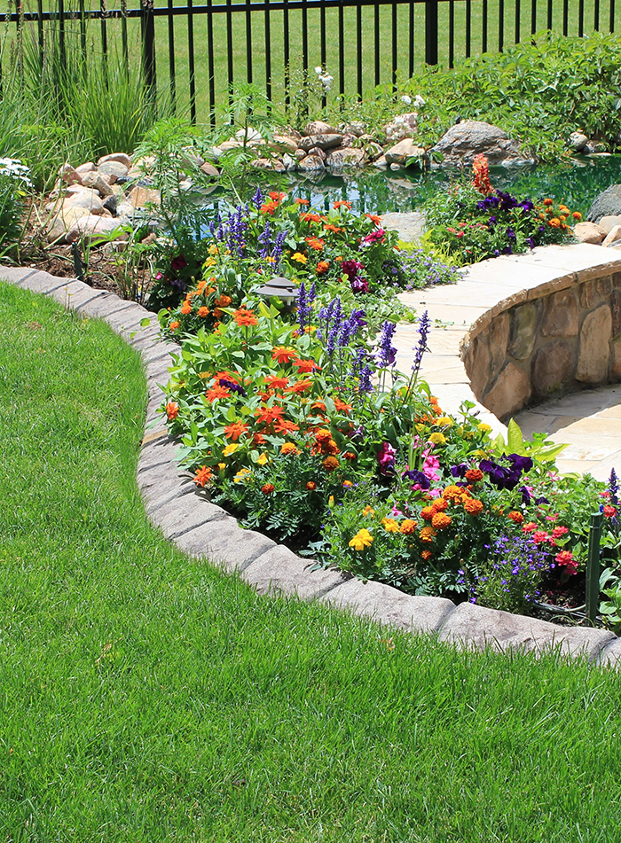 Concrete curbing with landscaping services